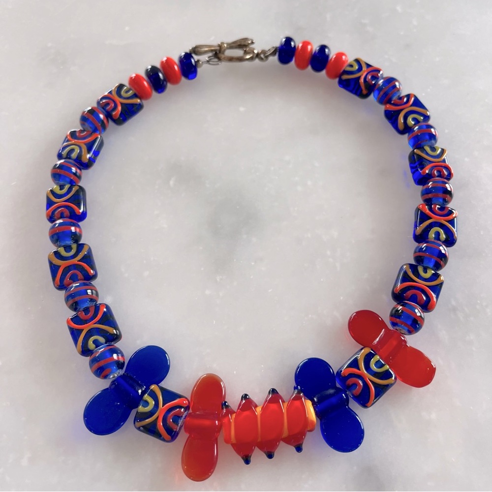 Colorful glass pieced custom made necklace. Blue/orange.